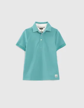 Polo turquoise col chemise trompe-l'oeil garçon